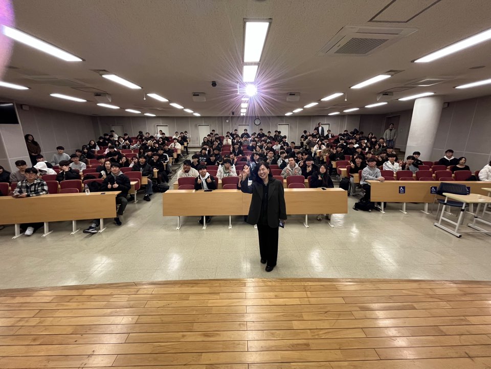 Sue Kim speaking at university